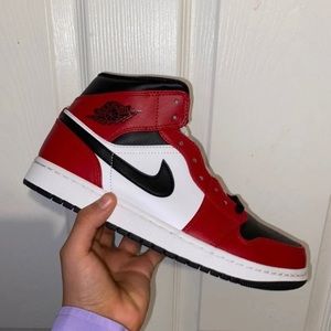 Jordan one mid black toe